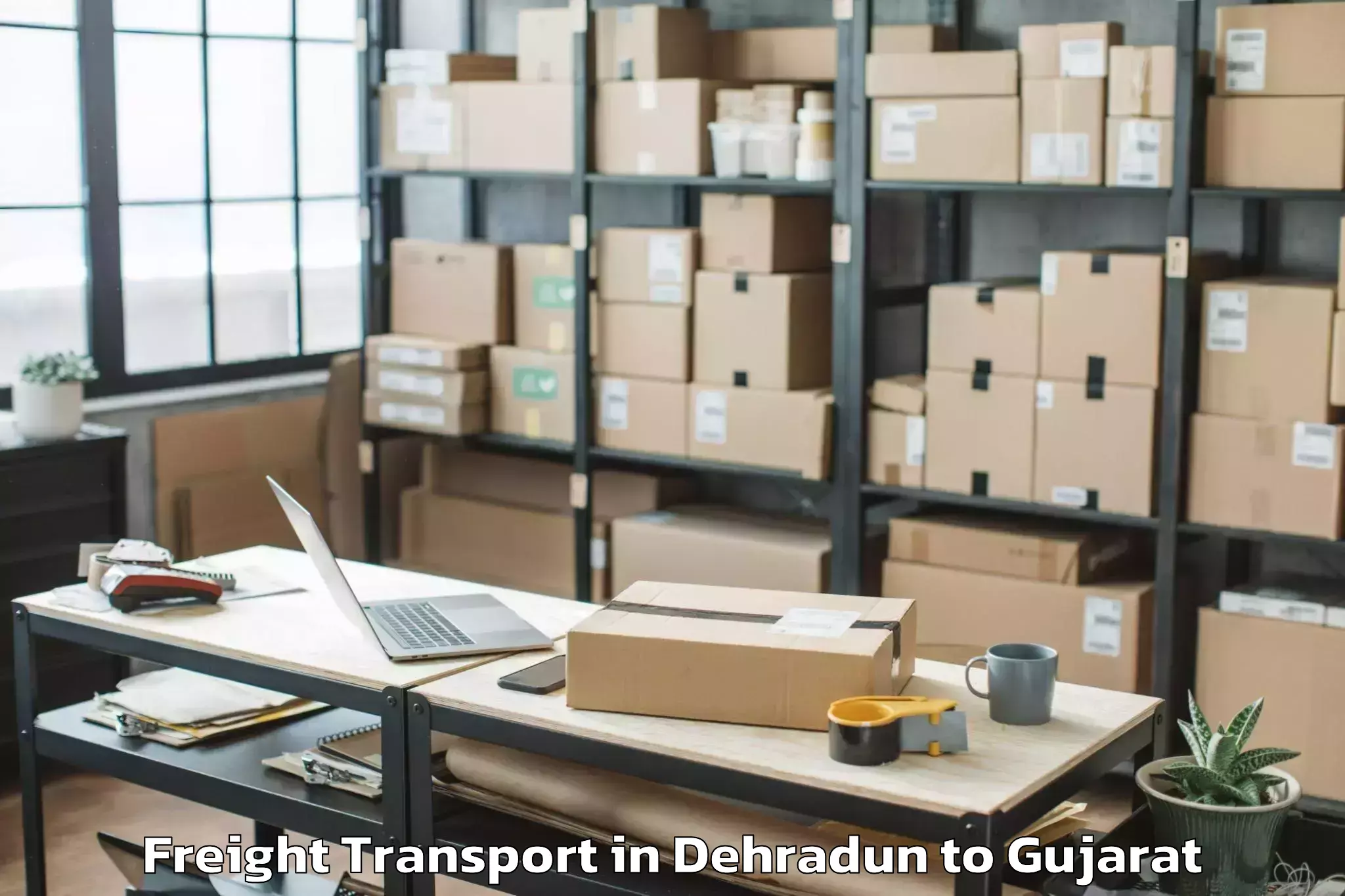 Dehradun to Khambhalia Freight Transport